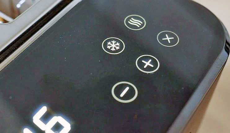 Что такое функция размораживания в тостере?