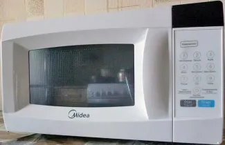 Микроволновая печь Midea EM720CКE белый