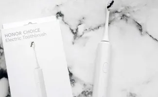 Обзор электрической зубной щетки Honor Choice